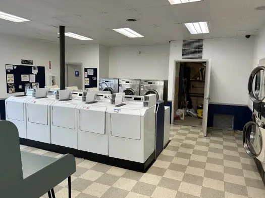 Kiel Washbasket Laundromat interior view of washers.